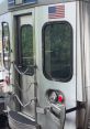 Rear view of an MFL SEPTA train car door, showcasing the American flag and operational design features.