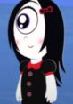 Iris, a character by Stacey DePass, features a single large eye and a cute black dress with a red collar and bows.