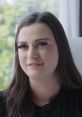 Woman with long hair shares insights about innovative strategies in Kylie Marketing, emphasizing brand growth and engagement.
