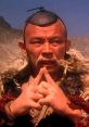 A contemplative character with distinctive hairstyle, embodying wisdom and strength, reminiscent of Uncle Iroh's essence.