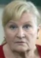 Concerned expression of an elder woman with blonde hair, embodying the spirit of "Old Betty V2" character.