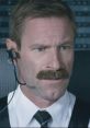 F-O Jeff Skiles, portrayed in Sully (2016), showcases intense focus in the cockpit during critical flight moments.