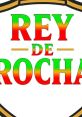 Colorful logo featuring the text "Rey de Rocha" in vibrant red, green, and yellow, highlighting cultural significance.