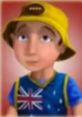 Andy from "Big City Adventure" wears a yellow hat and an Australia-themed shirt, ready for his next exciting journey.