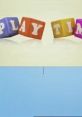 Colorful blocks spell "PLAY TIME" against a light background, emphasizing fun and creativity in play activities.
