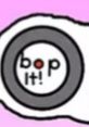 Close-up of the "bop it!" game control, featuring its signature design and vibrant background, perfect for fun gameplay.