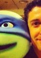 Jason Biggs poses with Leonardo, showcasing a fun moment with the animated character from the TMNT franchise.
