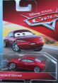 Disney Pixar Cars Natalie Certain collectible toy car displayed in packaging, featuring vibrant colors and detailed design.