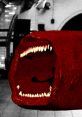 A monstrous train eater with sharp teeth and a vivid red texture lurking in a dimly lit subway station.