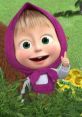 Cheerful Masha in a pink scarf smiles and gestures among vibrant flowers and greenery, embodying playful innocence.