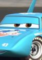 Close-up of Strips Weather King, the blue racing car with iconic design and 43, showcasing his determined expression.