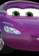 Close-up of Holley Shiftwell, the stylish purple car with green eyes from the "Cars" movie series, showcasing her sleek design.