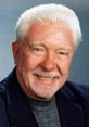Charlie O'Donnell smiling, known for his impactful voice work and contributions to the entertainment industry.