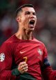 Cristiano Ronaldo celebrates passionately in Portugal's national jersey, showcasing determination and competitive spirit.