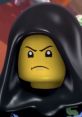 Lloyd Kid LEGO character in a black hood, displaying a determined expression with intense eyes, perfect for collectors.