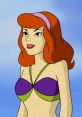 Daphne Blake 'Grey Griffin' (Scooby-Doo) Daphne is the fashionista of Mystery Incorporated. She's in love with Fred, and she