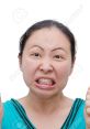 Angry expression of a woman in a teal shirt, showcasing intense emotions and frustration, ideal for depicting "Angry - Yunxia.