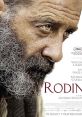 Close-up of a man with a rugged beard, promoting the film "Rodin" (2017) directed by Jacques Doillon, Cannes Film Festival selection.