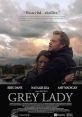 Promo poster for "Grey Lady" (2017), featuring Eric Dane and Natalie Zea in a thrilling embrace against a dramatic backdrop.