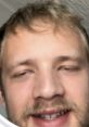 Close-up of a cheerful person showcasing a relaxed expression, contributing to the authentic vibe of Husk IRL community.