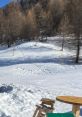 Snowy landscape with wooden chairs and table, perfect for enjoying a winter day and testing Lucy Voice Clone features.