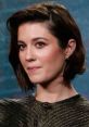 Mary Elizabeth Winstead showcases her unique style with a confident expression at a recent event, highlighting her beauty.