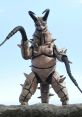 Gudon stands powerfully atop rocky terrain, showcasing its fierce spiked form and menacing presence. Perfect for collectors.