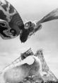 Showa Mothra (1961) flying over a destroyed cityscape, showcasing its iconic wings and symbolic role in Japanese cinema.