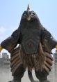 Bemstar, the giant bird monster, stands in a cityscape, showcasing its unique features and imposing presence.