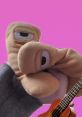 Playful puppet hands against a vibrant pink background, showcasing creativity and fun in Sherman Fuquez-style performances.
