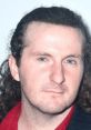 Ed Gage Ed Gage is a multifaceted performer known for his dynamic presence in the entertainment industry. Hailing from the