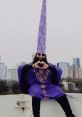 Planet Ruti Planet Ruti is a vibrant and charismatic artist, known for his unique persona as a dancing purple-wizard ian. He
