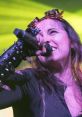 Nina Osegueda Nina Osegueda is an acclaimed heavy metal frontwoman known for her powerful vocal range and dynamic stage