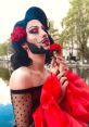 Eden Darling Eden Darling is a vibrant and charismatic Spanish bearded drag queen who captivates audiences with her