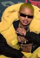 Slick Woods Slick Woods, a striking figure in the entertainment industry, has captivated audiences with her unique blend