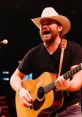 John Baumann John Baumann is an esteemed songwriter, singer, and showman hailing from the vibrant landscape of Texas. With
