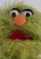 Steve the Puppet Steve the Puppet is a charming and vibrant green puppet known for his engaging personality and signature