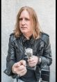 Izzy Presley Izzy Presley is a multifaceted entertainer known for his vibrant and energetic personality, skillfully