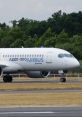 Airbus A220-300 on the runway, showcasing its sleek design and advanced GPWS technology for safe landings.