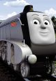 Spencer the Express Engine smiles confidently on the tracks, showcasing his sleek design from the CGI Era of Thomas & Friends.