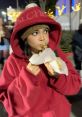 Maddison Jackson enjoying street food in a cozy red hoodie, surrounded by festive lights and a lively crowd.