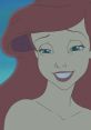 Ariel's warm smile reflecting her motherly love in The Little Mermaid II, showcasing Jodi Benson's voice in a heartwarming scene.