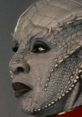 Gina Yashere as Lura Thok in Star Trek Academy, showcasing distinctive reptilian features and a fierce expression.
