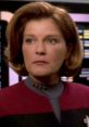 Captain Kathryn Janeway from Star Trek: Voyager displaying her intense Pissed Off Mode in a tense moment on the bridge.