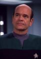 Doctor EMH, the Emergency Medical Hologram from Star Trek: Voyager, displays concern in a medical setting.