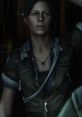Close-up of A. Ripley character exploring dark spaces in Alien Isolation, showcasing her determination and resilience.