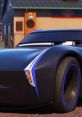 Close-up of a sleek, black racing car featuring blue accents, designed to resemble Jackson Storm from "Cars.