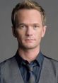 Neil Patrick Harris in a stylish vest and tie, showcasing his signature suave look. Ideal for fans and fashion enthusiasts.