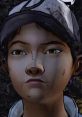 Clementine from Season 2 of TWD, showcasing determination and resilience in a post-apocalyptic world.