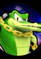Vector the Crocodile poses confidently, showcasing his signature green scales and gold chain, embodying his street-savvy character.